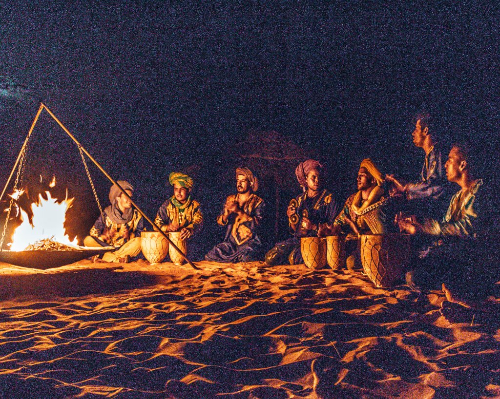 Listening to Berber music in the Sahara Desert. Must-see in Morocco