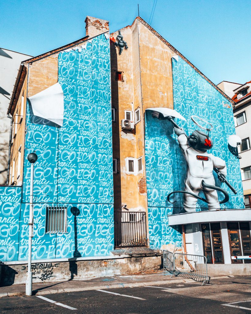Bratislava Street art baby wallpapering the building Slovakiawediditourway.com