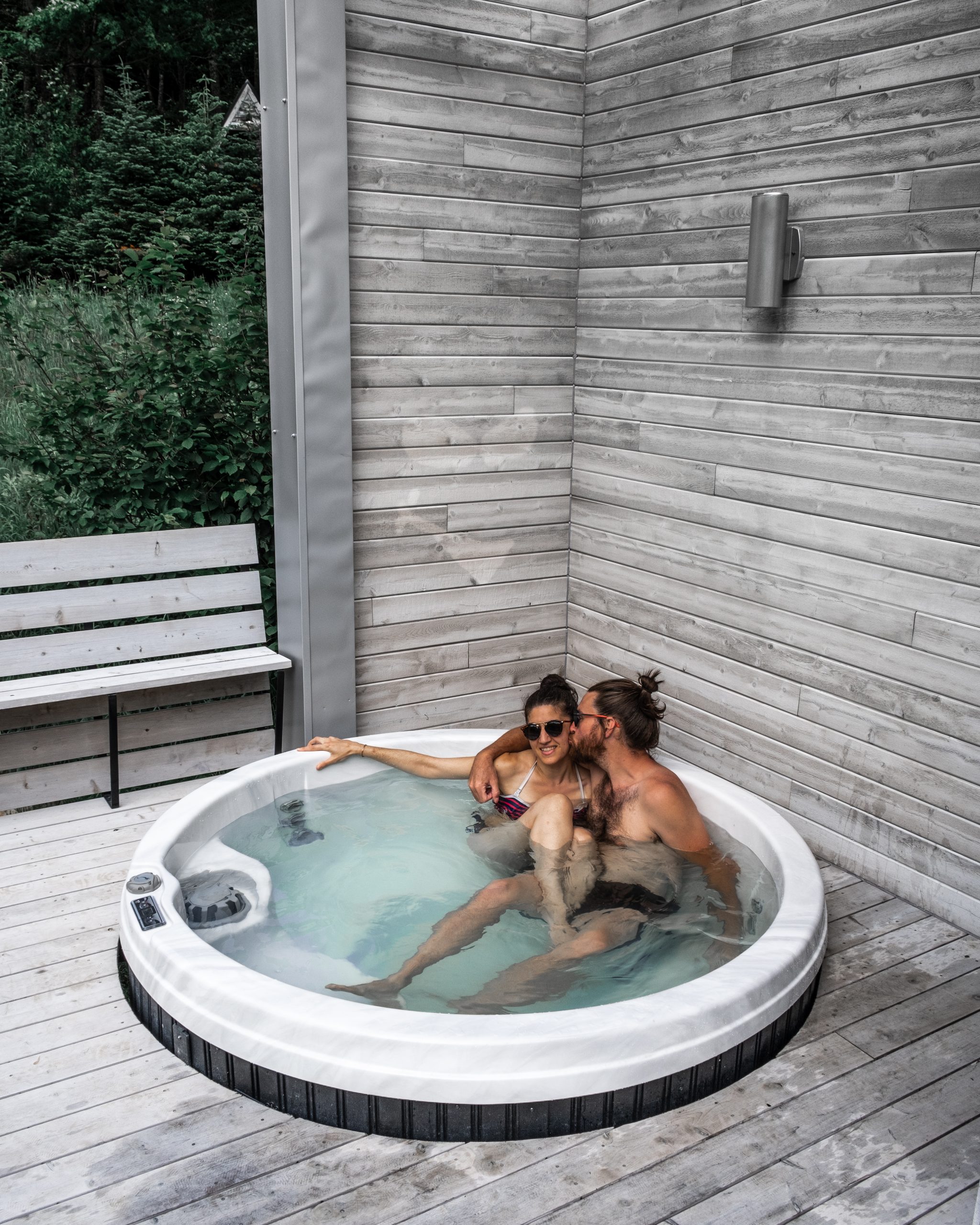Hanging out in the hot tub at Nöge Hebergement, one of 6 unique cottages in Quebec. They're perfect for your next vacation.