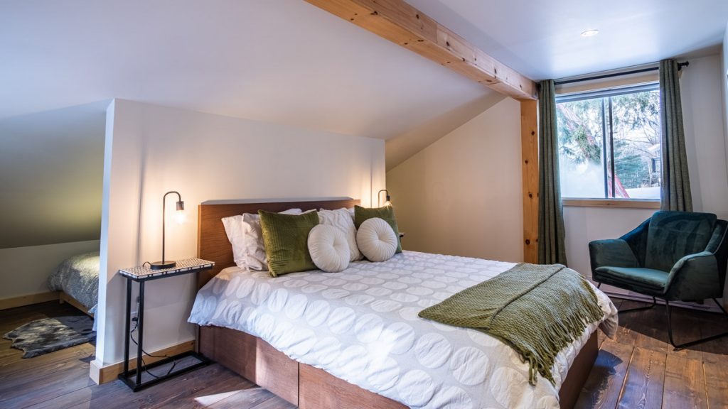 The main bedroom in Chalet Denmark, a chalet in Orford