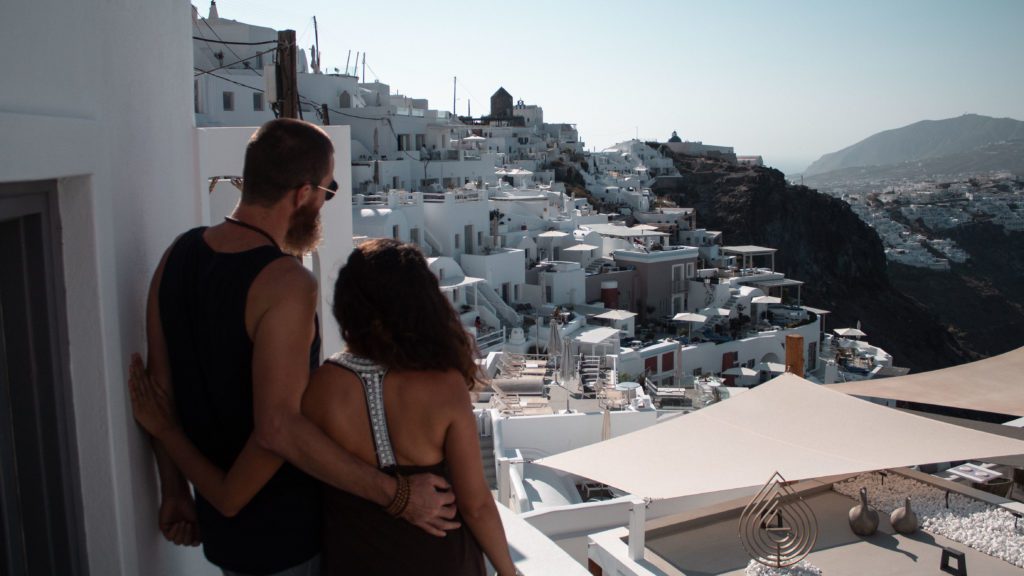 Young Couple Admiring The View In A Greek Island, Greece