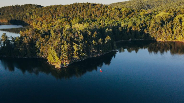 Canoe in Outaouais. Lake des 31-milles. Best things to do in Quebec tourist region of Outaouais