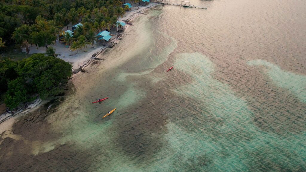 Kayaking in Glover's Reef, one of the bucket list things to do in Belize